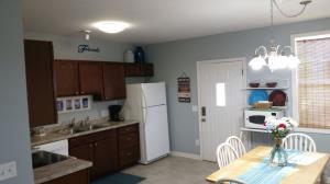 Open kitchen and dining area with a dining large enough for family games (games provided)